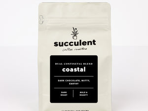 Coffee bag labeled 'succulent coffee roasters' with 'Coastal' blend description on a white background