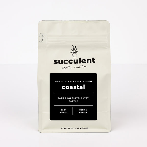 Coffee bag labeled 'succulent coffee roasters' with 'Coastal' blend description on a white background